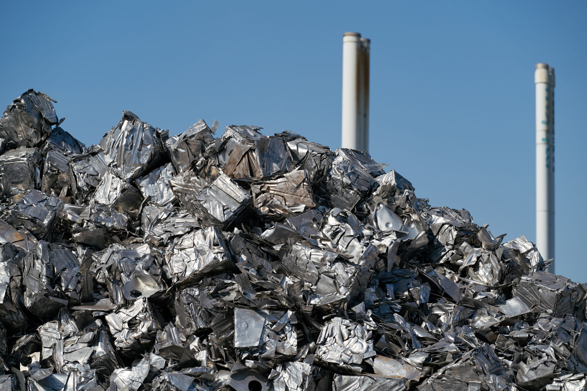 Aluminum scrap is the new battle front in critical minerals war. Cubes of pressed scrap at a scrap yard in the harbor in Magdeburg in Germany.